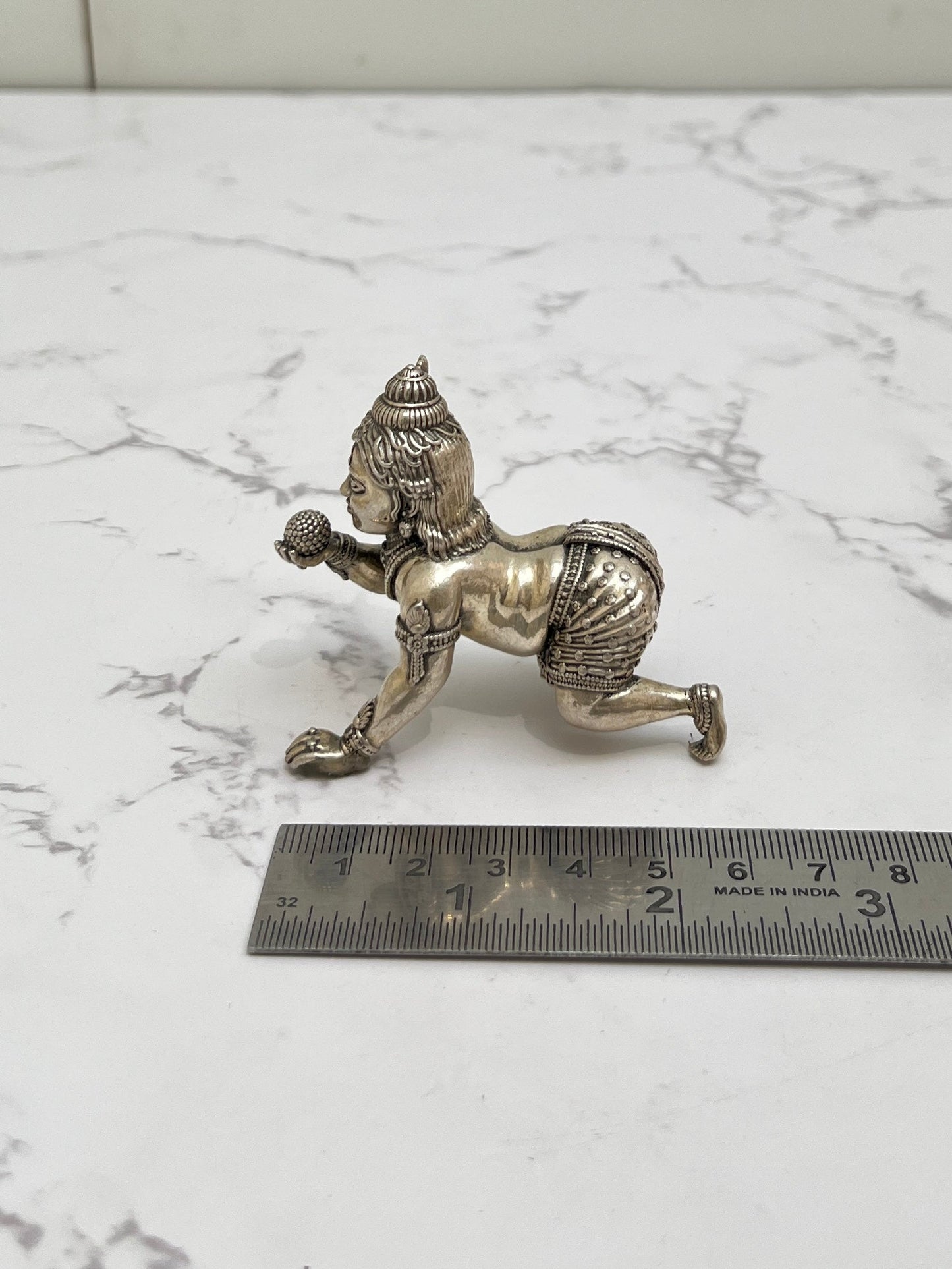 925 silver Bal Krishna idol showing scale – compact puja murti