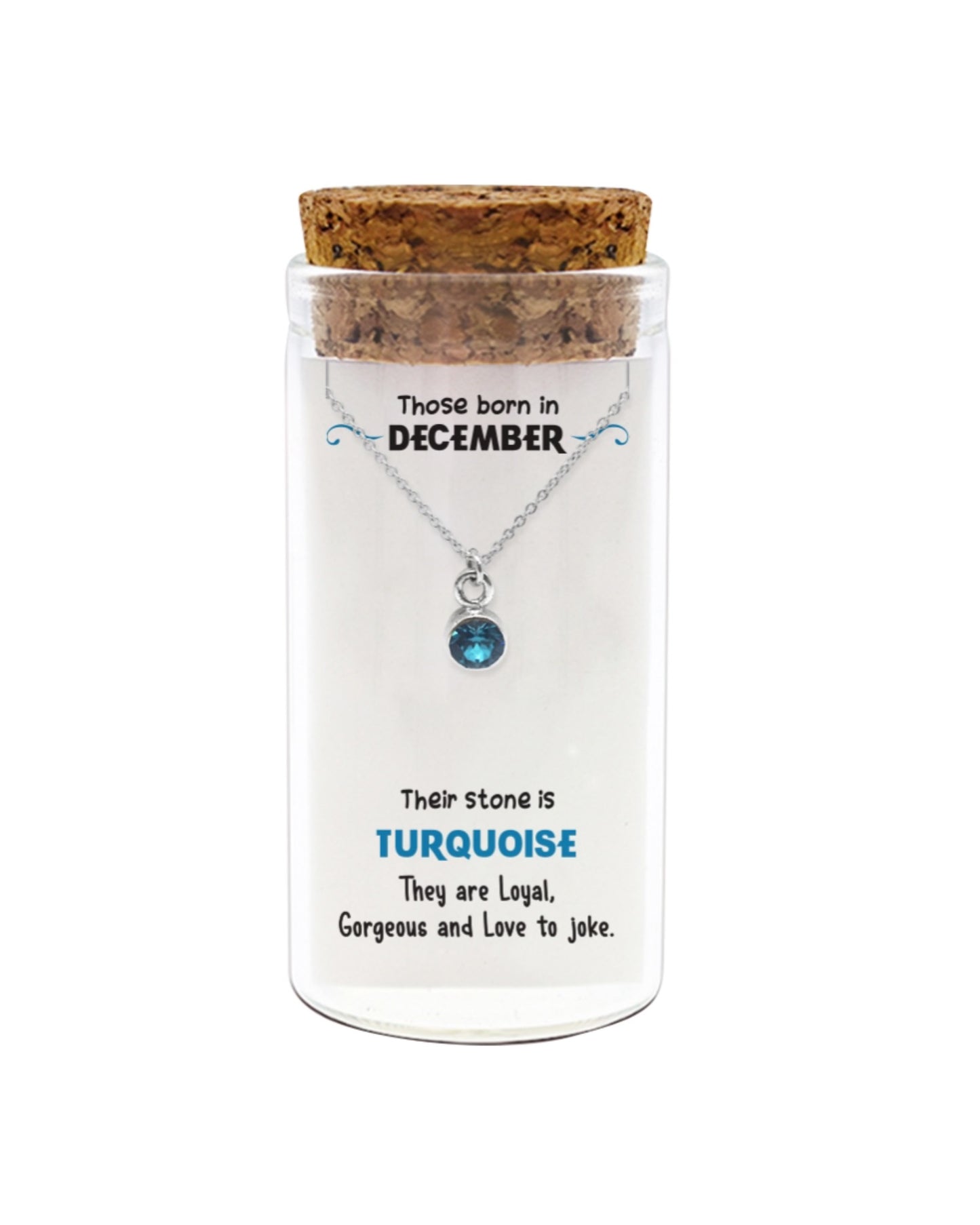 Necklace with a turquoise stone in a glass display box with text about December birthdays.