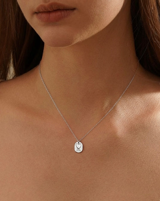 Model wearing granddaughter heart pendant necklace 925 silver – meaningful family jewelry on model