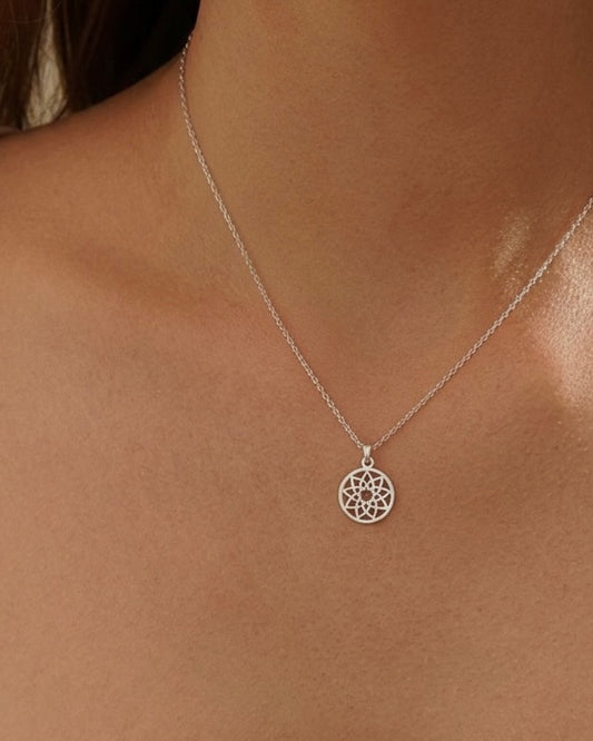 Model wearing mandala necklace – intricate circular mandala charm