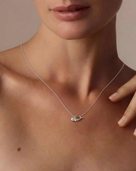 Model wearing whale necklace – beautiful ocean charm for inspiration