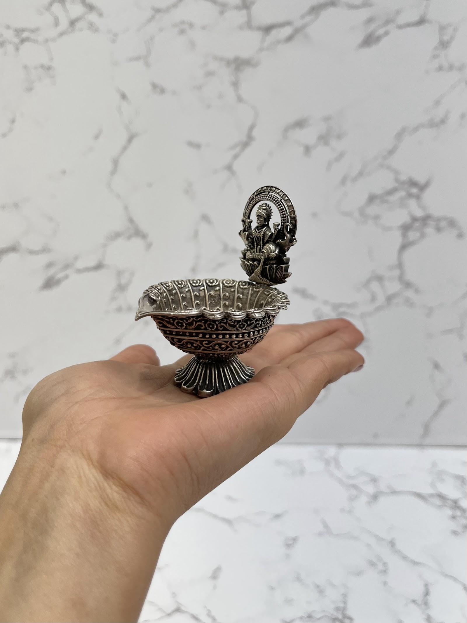 Silver Lakshmi Diya · 85 g, sterling silver