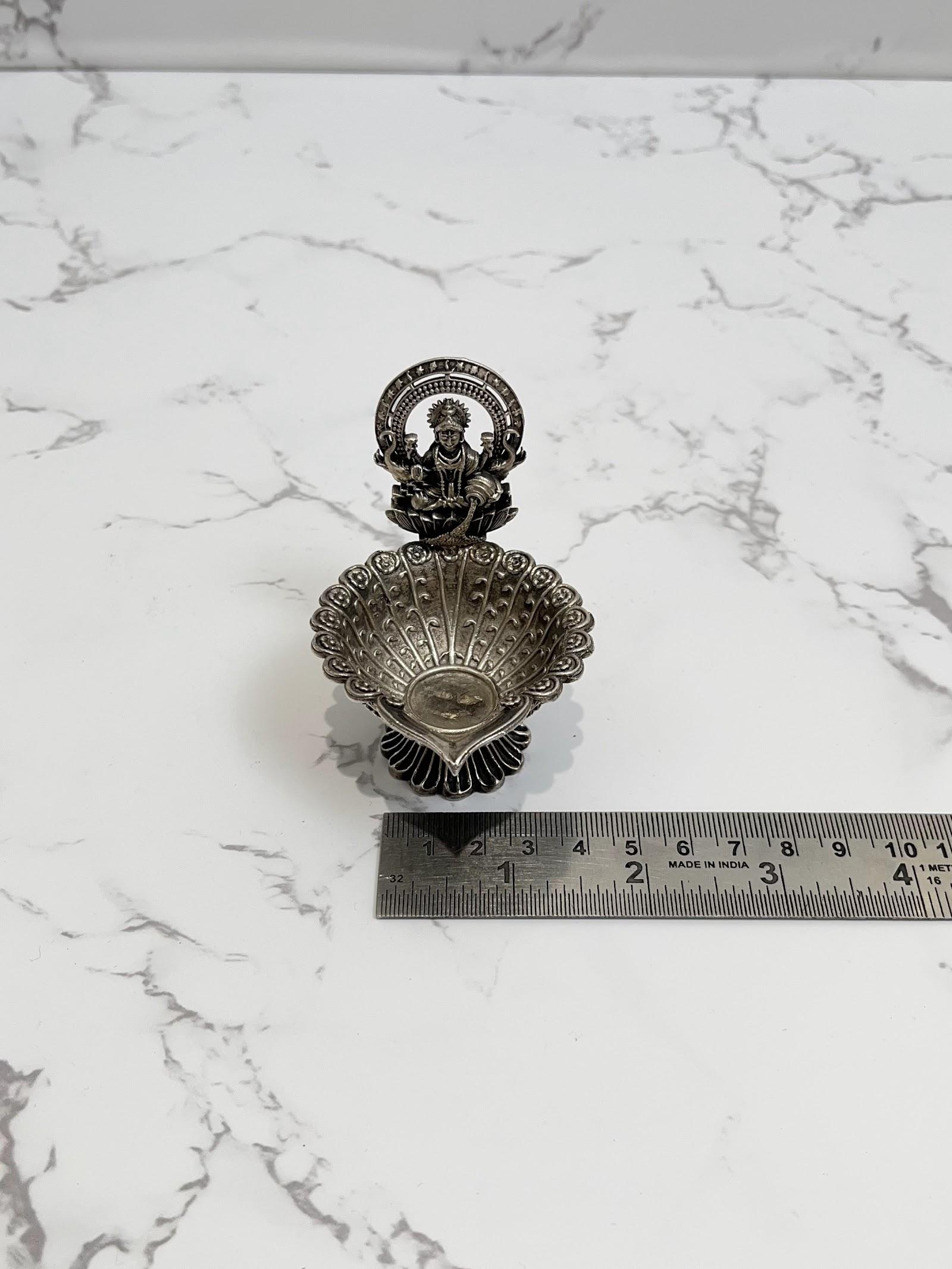 Silver Lakshmi Diya · 85 g, sterling silver