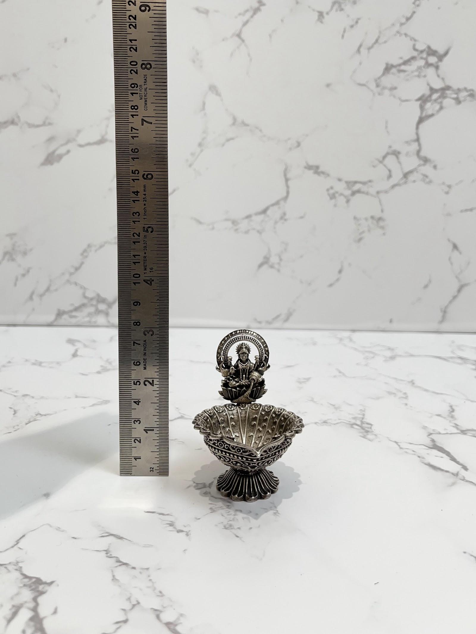 Silver Lakshmi Diya · 85 g, sterling silver
