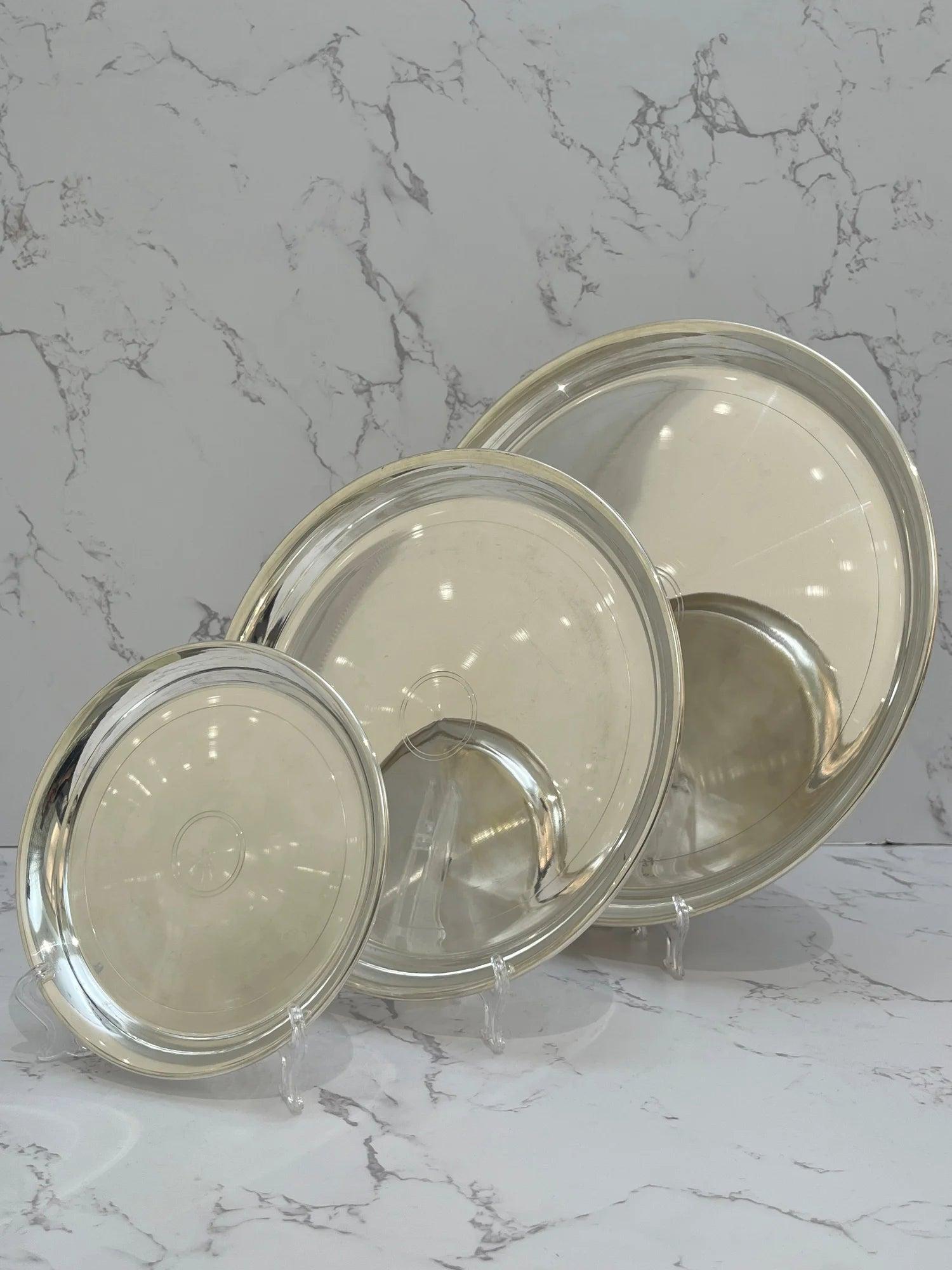 Silver Plates · 703 g, sterling silver
