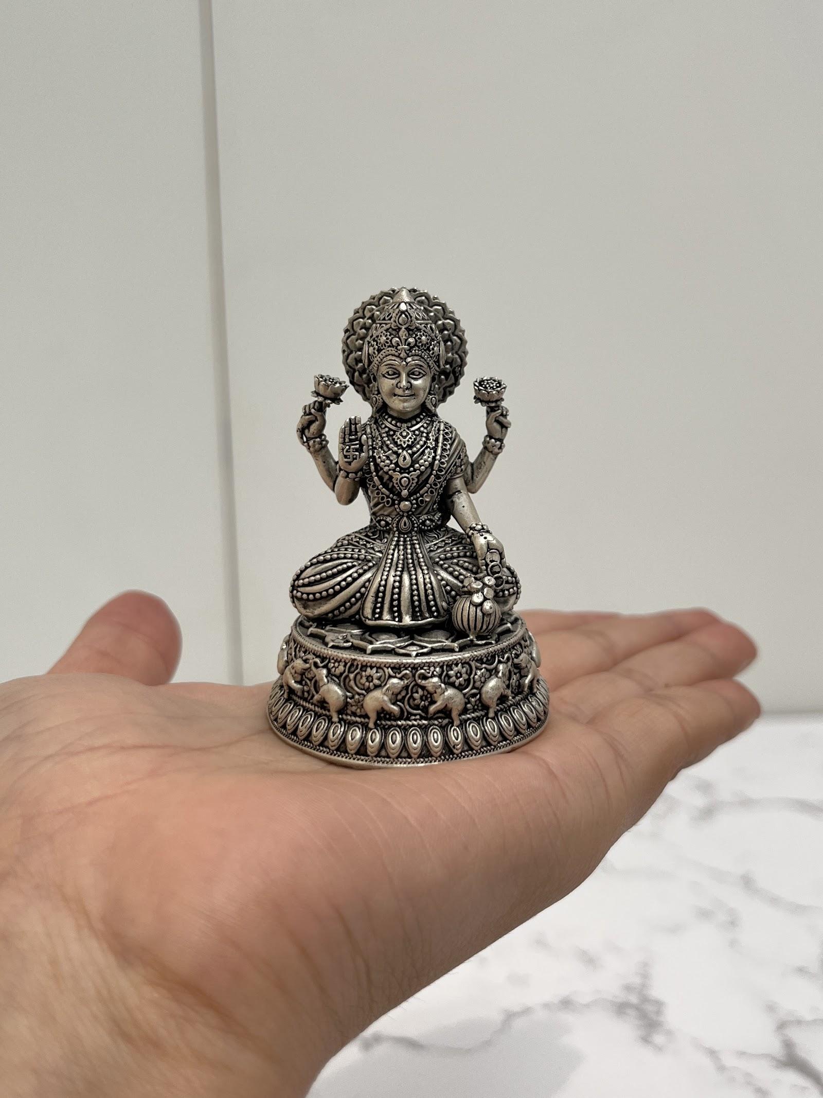 Silver Lakshmi Ganesh Idol · 51–174 g — 174 g