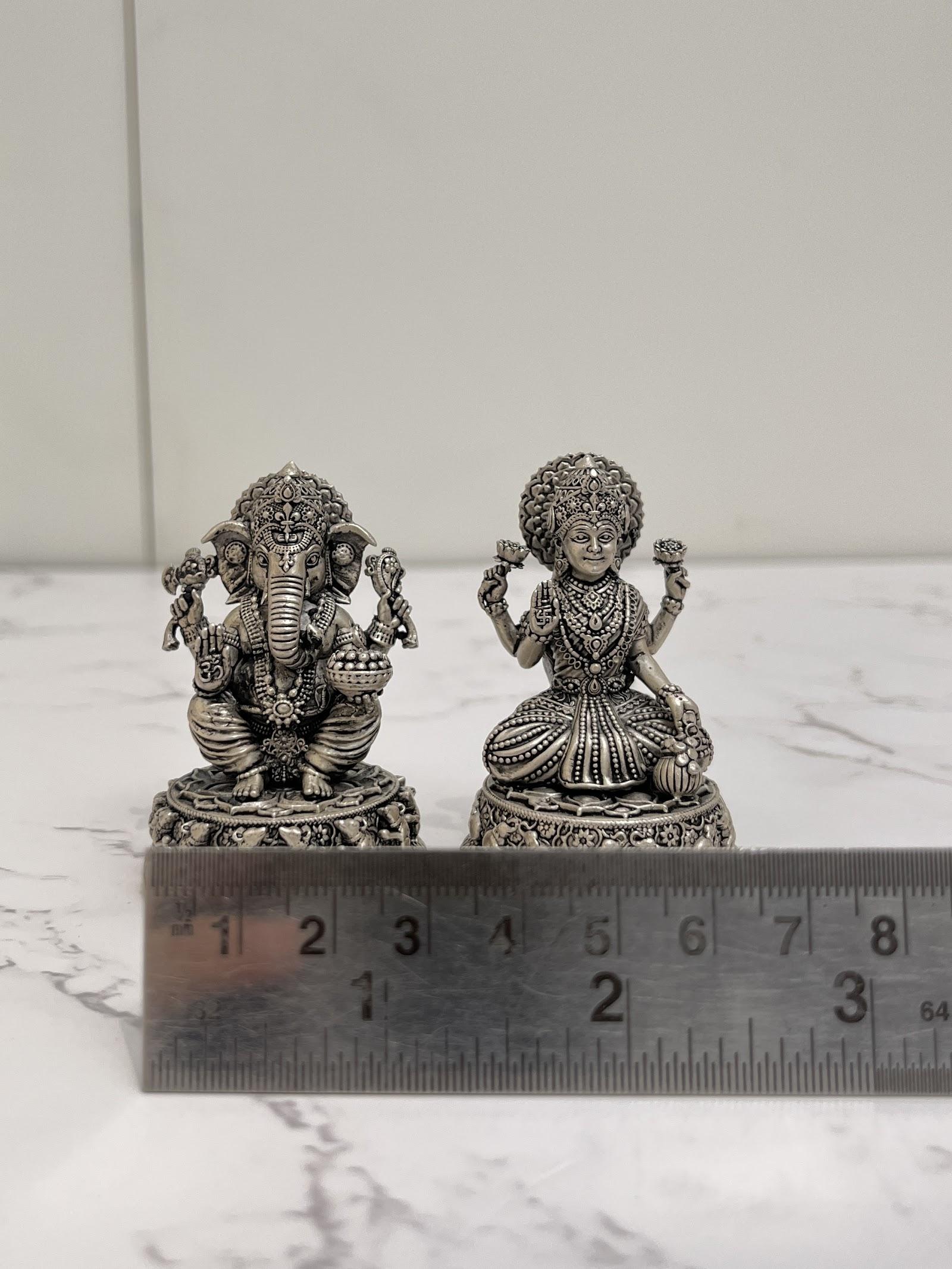 Silver Lakshmi Ganesh Idol · 51–174 g — 174 g