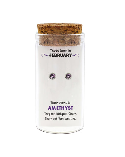 Jar with cork lid containing amethyst earrings and descriptive text on a white background