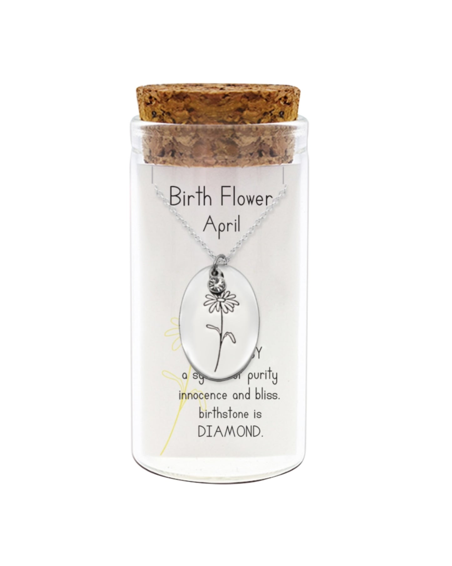 Birth flower necklace in a glass container with cork lid on a white background