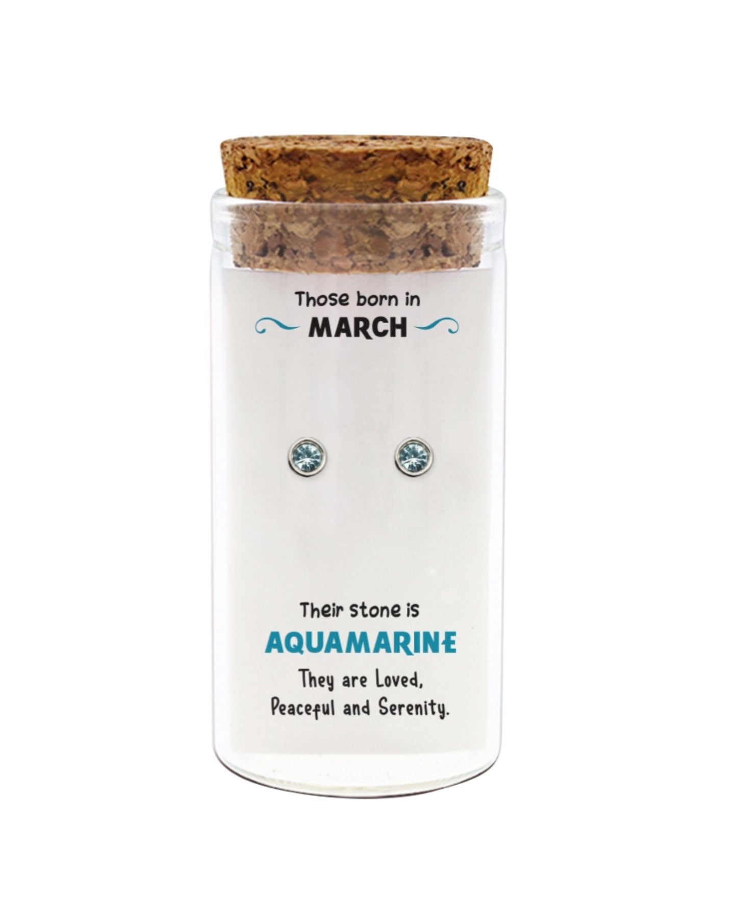 Glass jar with cork lid containing aquamarine earrings and descriptive text on a white background