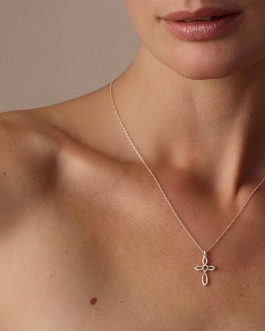 Model wearing Celtic cross necklace – intricate Celtic knot pendant