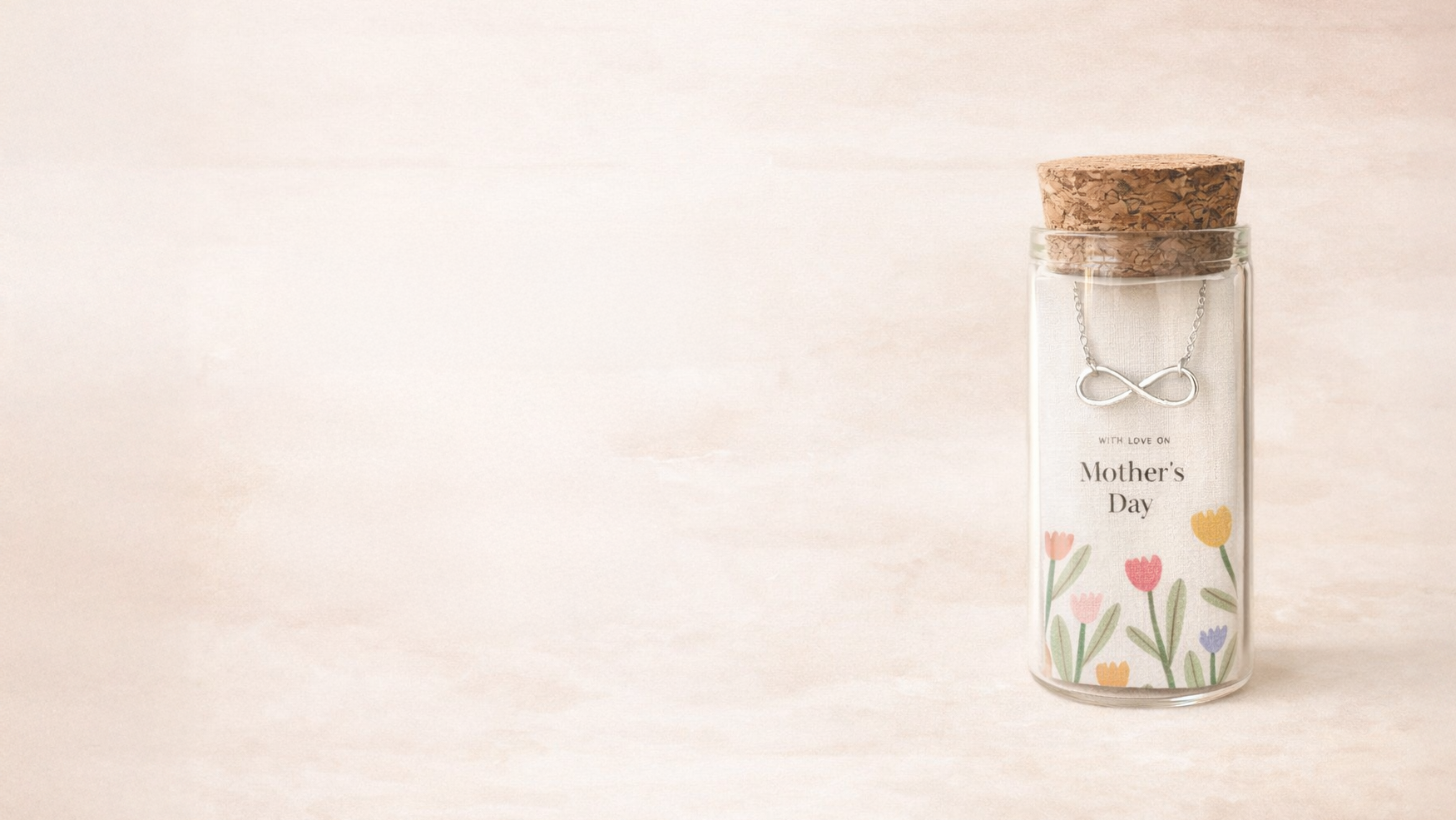 Glass jar with cork lid on a beige background, featuring 'Mother's Day' text and floral design.