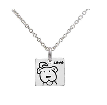 Close-up of dog/woof pendant with message 925 silver – detailed pet-inspired charm