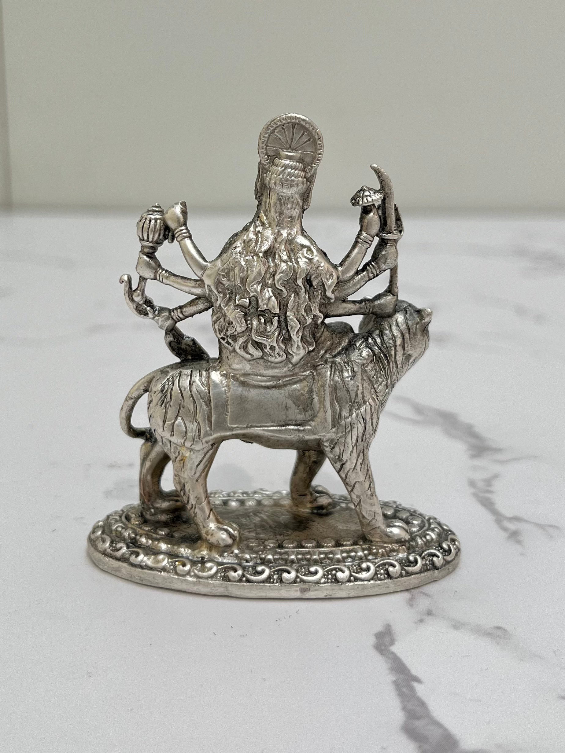 Back profile of 925 sterling silver Durga idol – intricate Tiger and weapons detailing