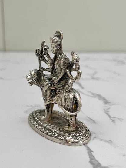 Side profile of 925 sterling silver Durga idol – intricate Tiger and weapons detailing