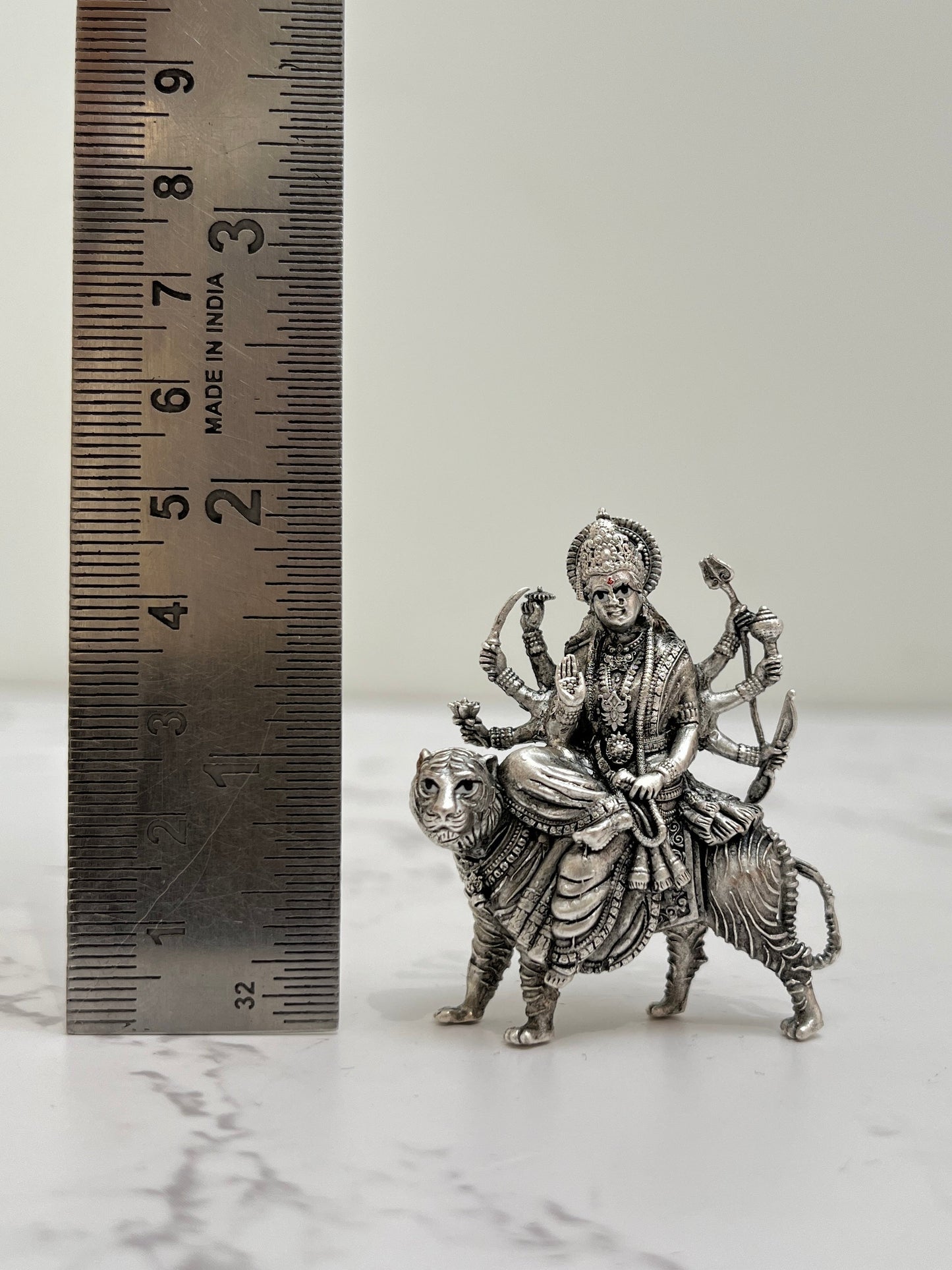 925 silver Durga idol showing scale – compact puja murti