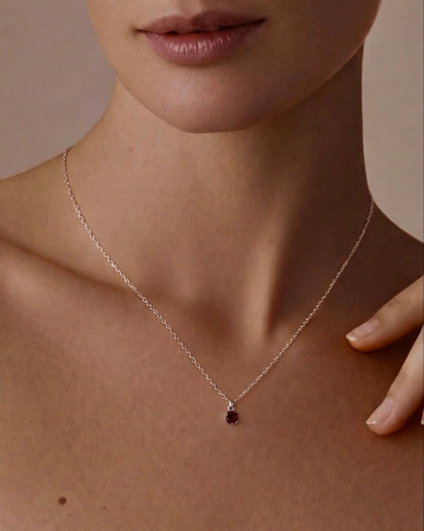 Model wearing birthstone necklace – delicate gemstone charm