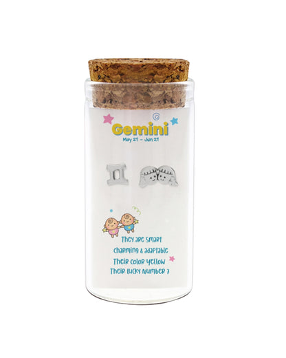 Decorative jar with cork lid featuring Gemini zodiac information on a white background