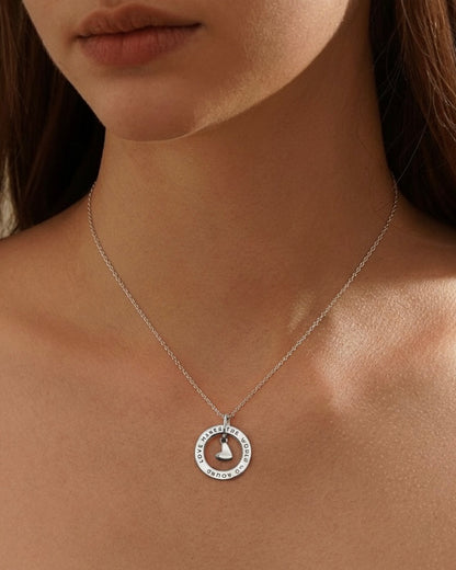 Model wearing "Love Makes The World Go Round" necklace – beautiful love jewelry