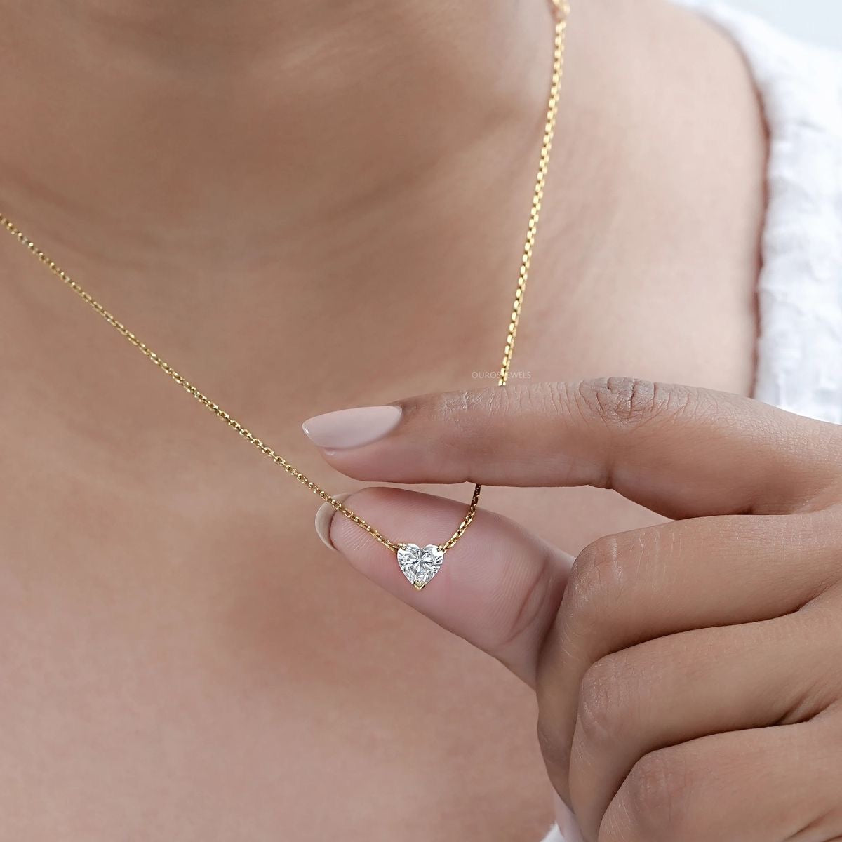 Heart diamond necklace worn on neck – elegant gold diamond necklace