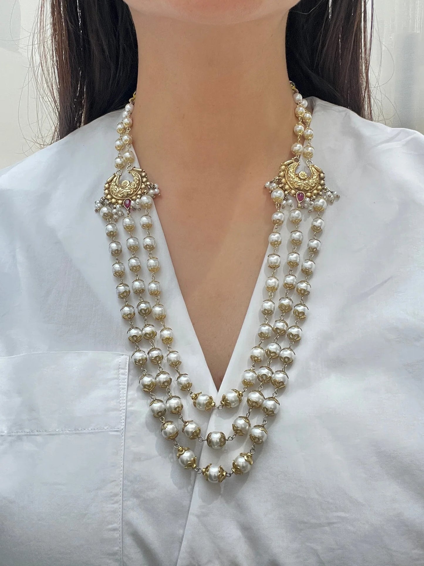 Women wearing 925 hallmarked sterling silver pearl necklace