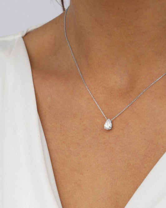 Pear cut diamond necklace worn on neck – elegant gold diamond necklace