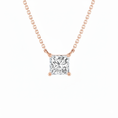 Rose gold necklace with a square-cut diamond pendant on a white background