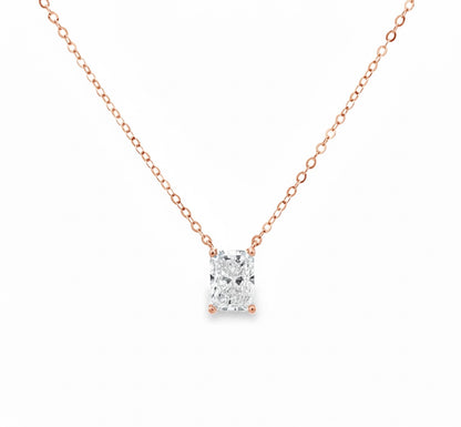 Rose gold necklace with a diamond pendant on a white background