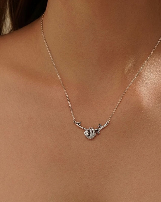 Model wearing sloth pendant necklace 925 silver – adorable sloth jewelry on model