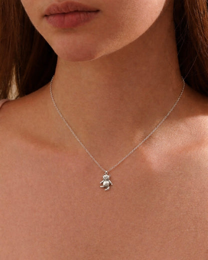 Woman wearing teddy bear pendant necklace 925 silver – adorable jewelry on model