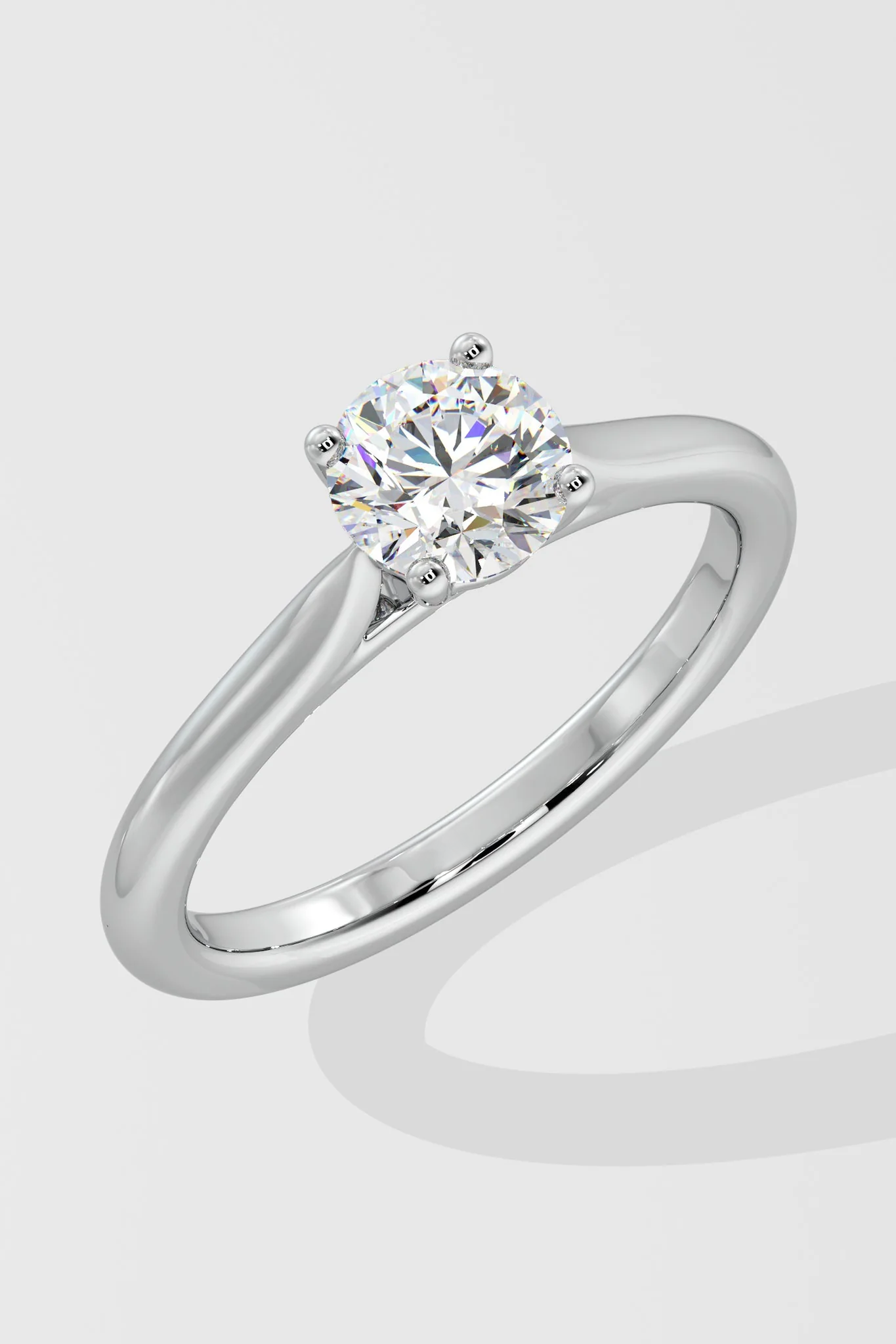 Diamond ring on a light gray background