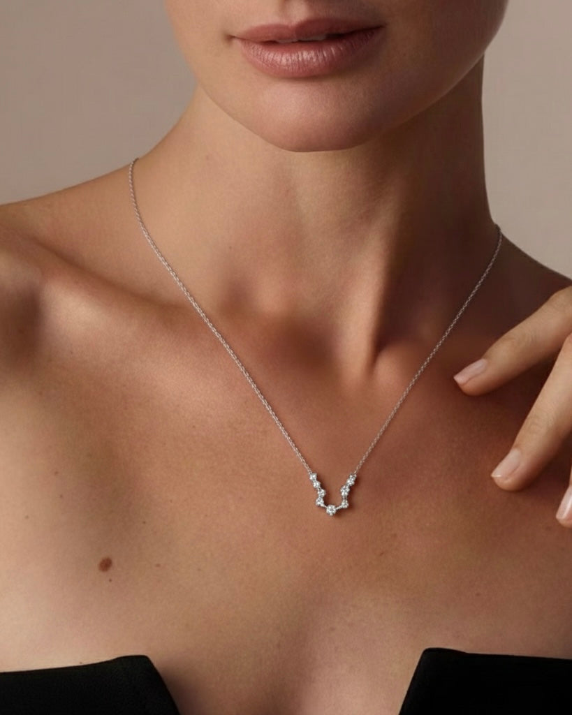 Model wearing zodiac necklace – adorable constellation charm