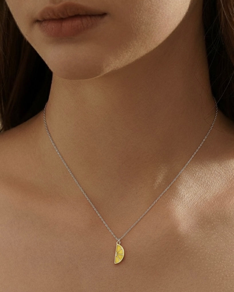 Model wearing lemon necklace – bright lemon pendant charm