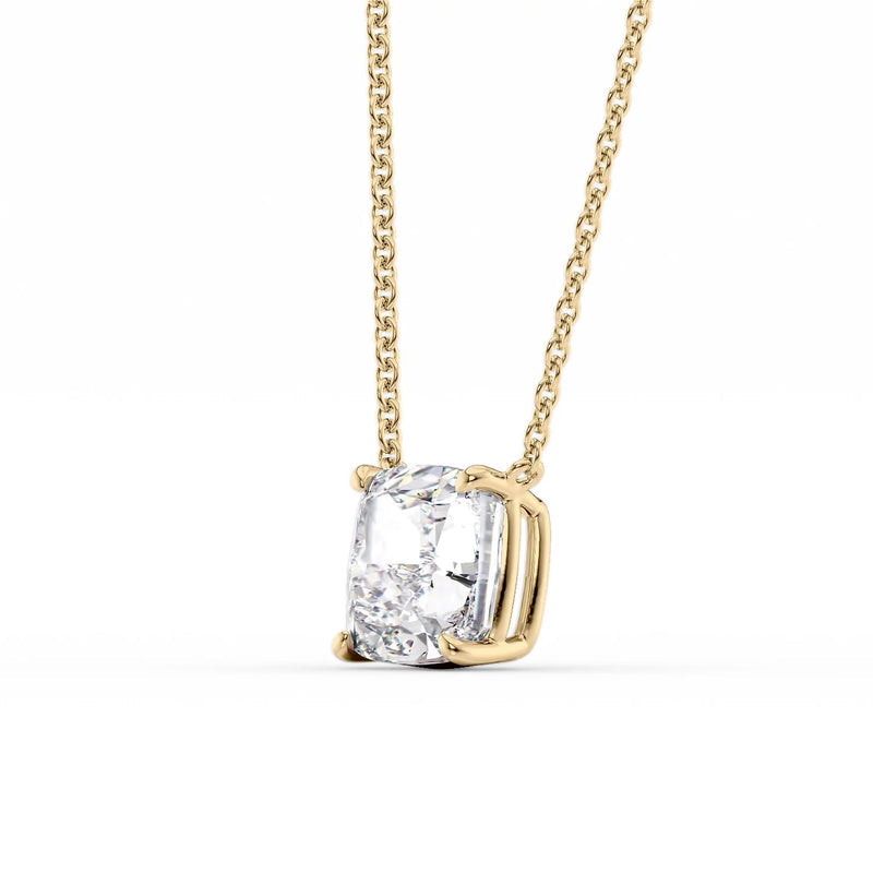 Side profile of custom cushion cut diamond necklace in gold highlighting setting and chain