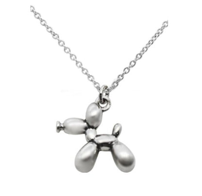 Close-up of dog charm pendant with balloon and message 925 silver – detailed cute detail