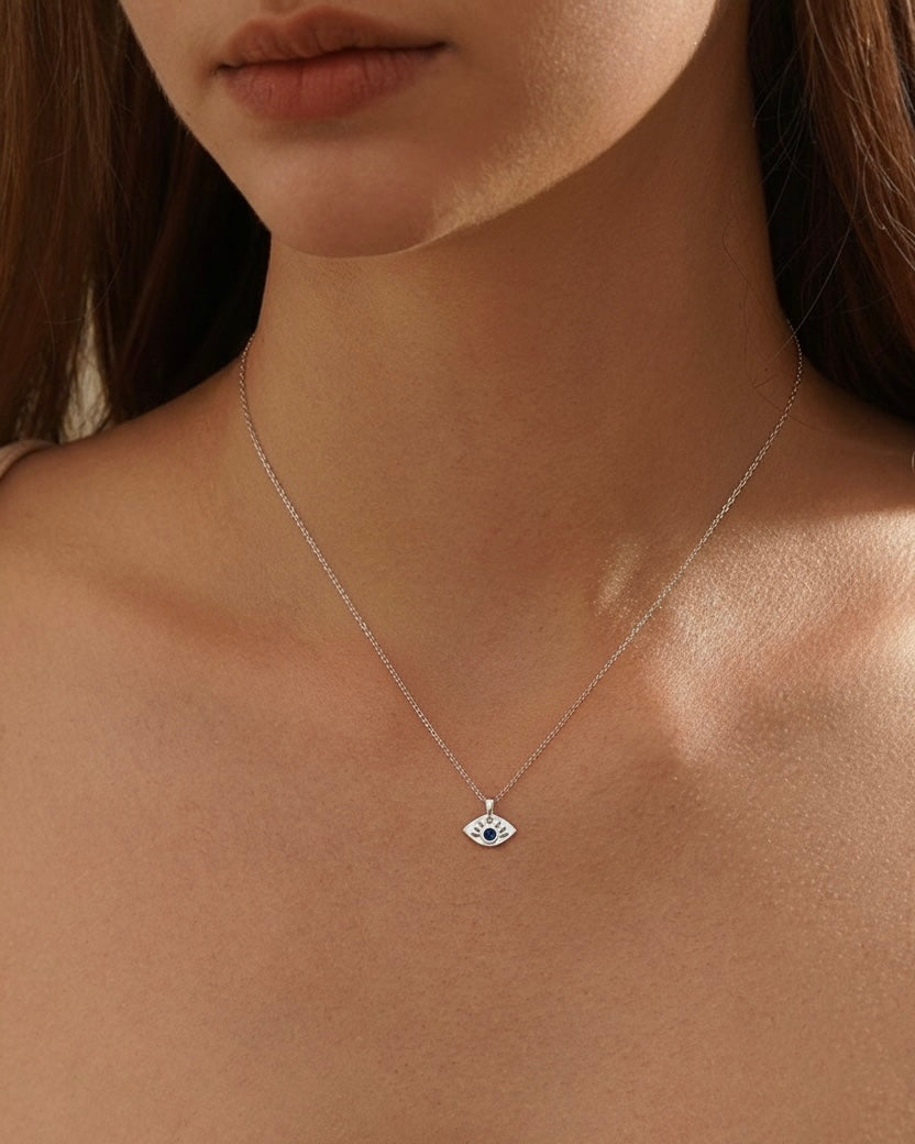 Model wearing evil eye necklace – classic protection pendant