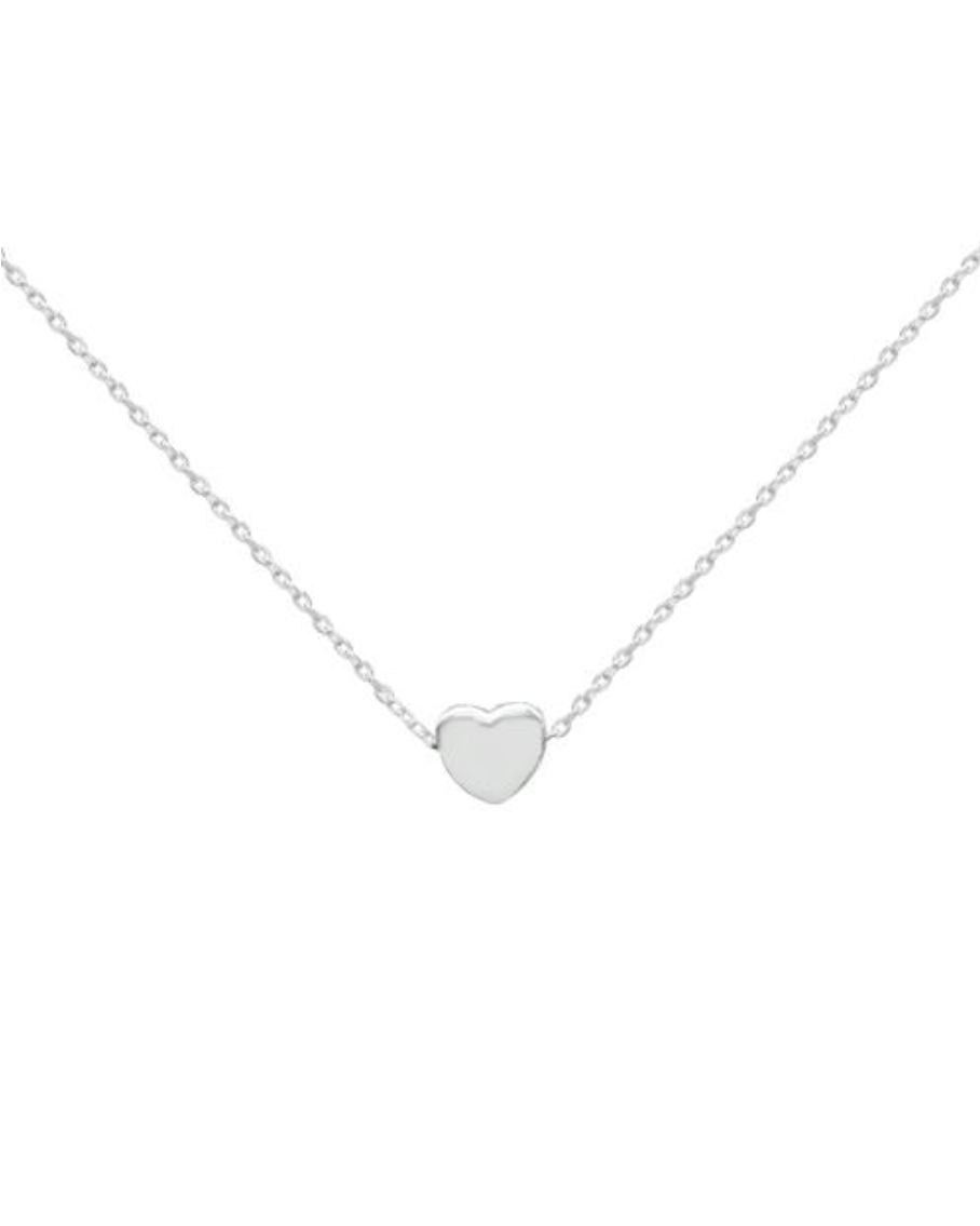 Close-up of heart pendant with handmade birthday cake illustration – detailed cute charm