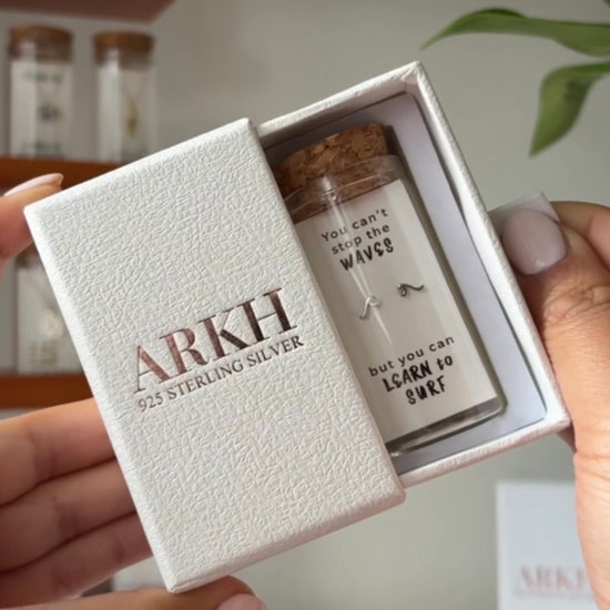 925 sterling silver wave stud earrings in glass jar with cork lid and motivational quote “You can’t stop the waves but you can learn to surf” – ocean inspired gift