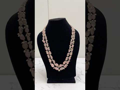 Video of 925 hallmarked sterling silver pink stone necklace with pearl beads.
