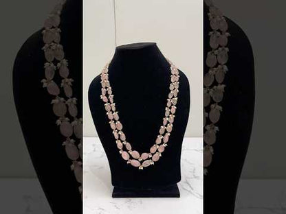 Video of 925 hallmarked sterling silver pink stone necklace with pearl beads.