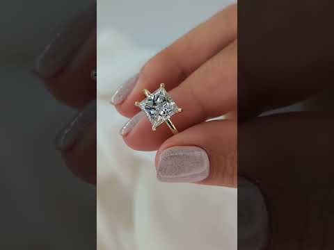 Hand Held Princess solitaire ring in gold with lab-grown diamond showing scale and sparkle