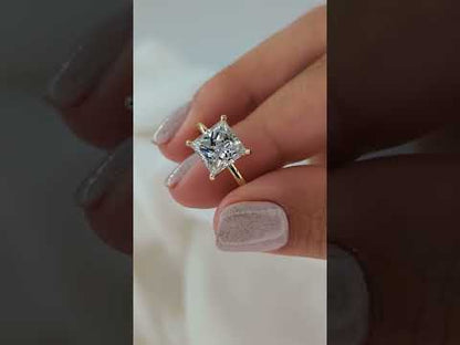 Hand Held Princess solitaire ring in gold with lab-grown diamond showing scale and sparkle