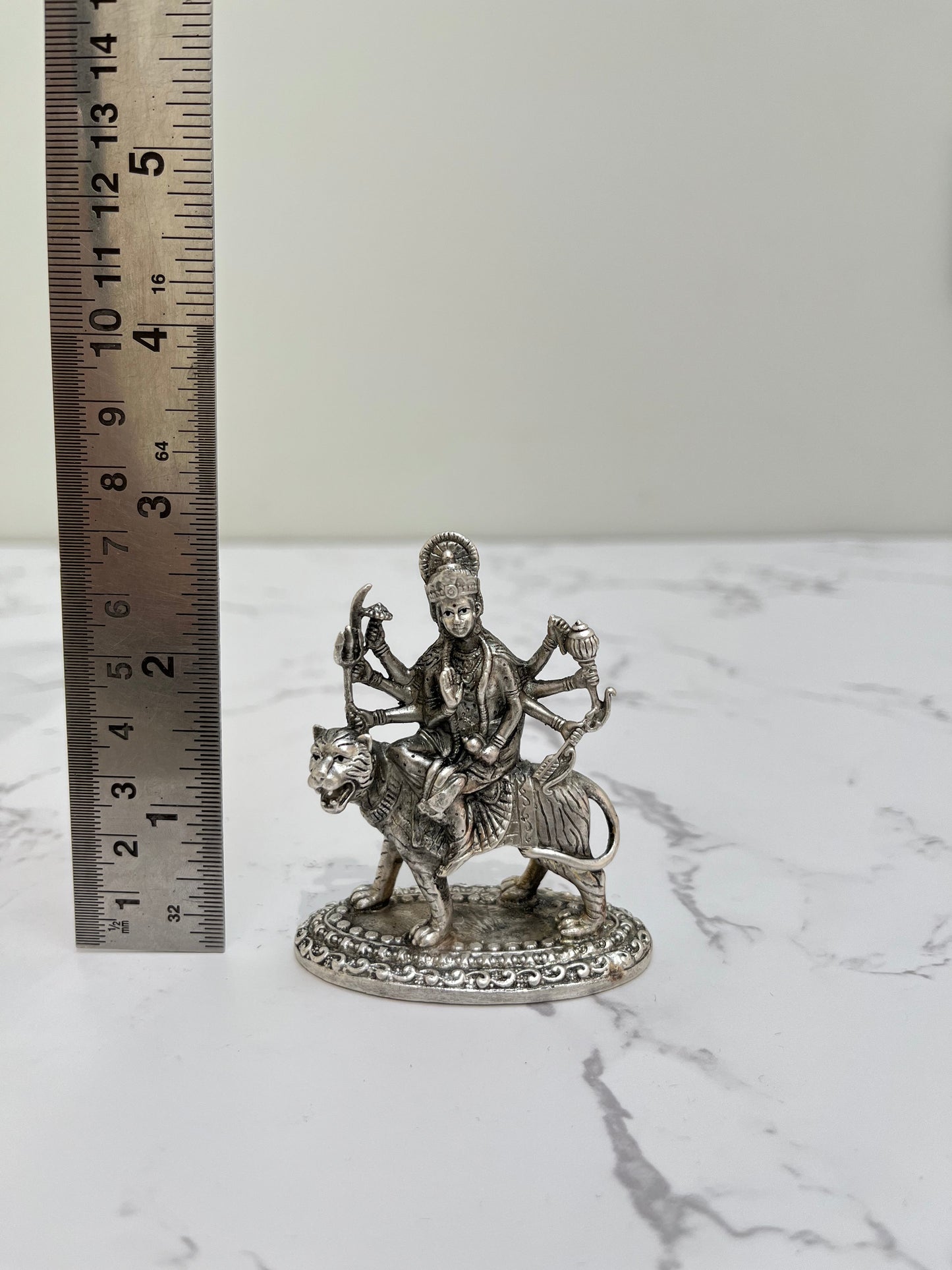  925 silver Durga idol showing scale – compact puja murti