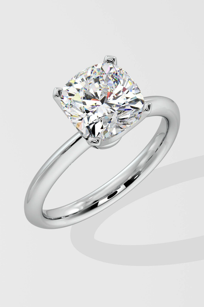 Diamond ring on a light gray background